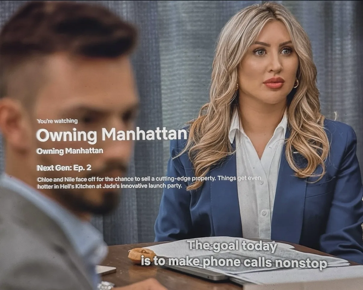 Blonde woman in a blue blazer at a table during a scene from Owning Manhattan.